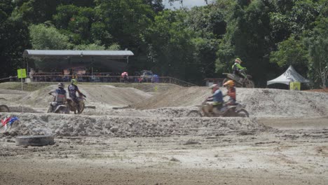 motocross race: intense competition on a muddy track