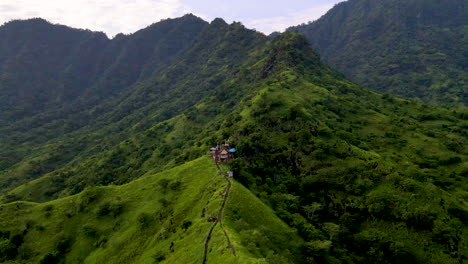 hiking trail and huts at the mountain ridge in west bali, indonesia