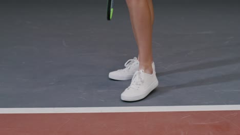 woman getting ready to play tennis