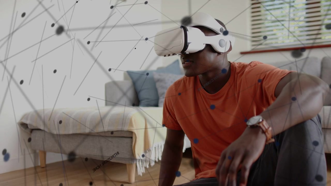 Uomo con visore VR si sporge in avanti, girando la testa mentre una grafica di rete si espande, esplorando la tecnologia.