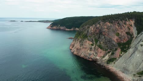 ocean against the cliffs on the cabot trail, nova scotia