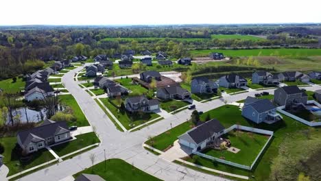 aerial flyover of a suburban neighborhood in the countryside