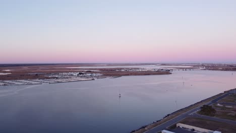Aerial-drone-shot,-flying-towards-a-marina-in-Cape-May-New-Jersey,-Cape-May-County