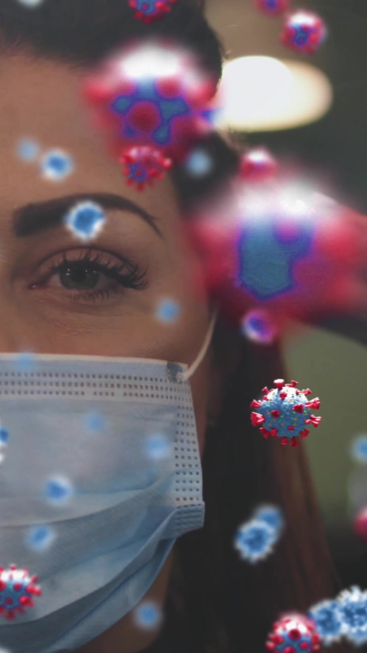 Animación de células de coronavirus sobre una peluquera caucásica y una mujer con mascarillas faciales