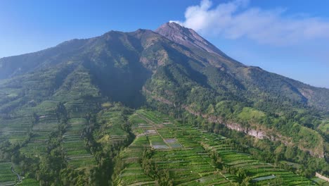 aerial view of stunning merapi volcano emitting smoke in iindonesia