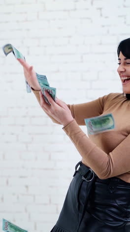 woman celebrating with flying money