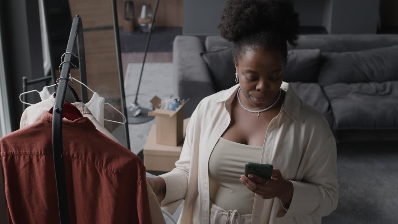 Image of a woman with clothes indoors