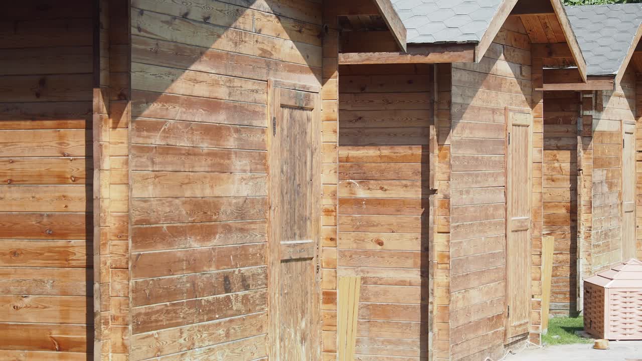 Wooden Cabins in a Row