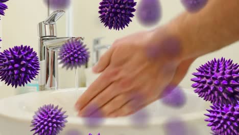 Animation-of-macro-coronavirus-Covid-19-cells-spreading-over-woman-washing-her-hands