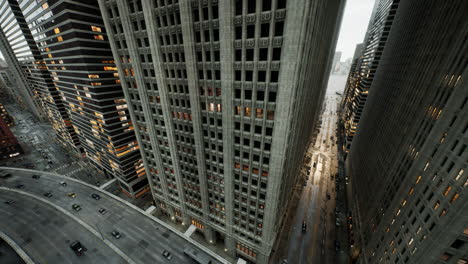 Aerial-hyperlapse-of-busy-car-traffic-in-between-Skyscrapers-city-center