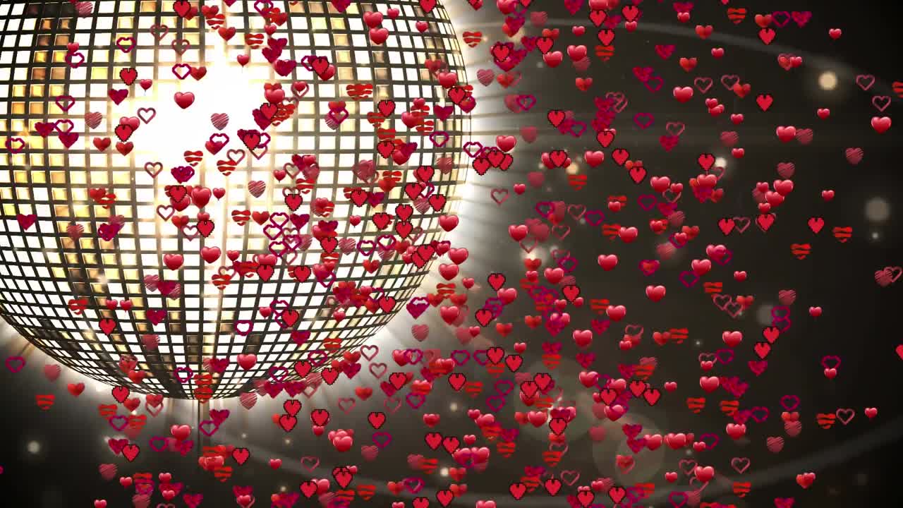 검은색 배경에 디스코 공 위에 빛의 반점과 심장의 애니메이션