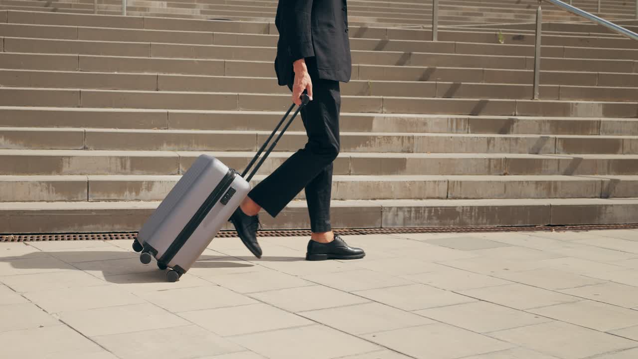 Tourist man with suitcase baggage in spain, A traveler with luggage suit jacket on business street go to a hotel, business office, airport terminal, enjoying the vibrant atmosphere