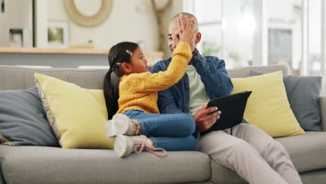 tablet, high five and a man with his daughter