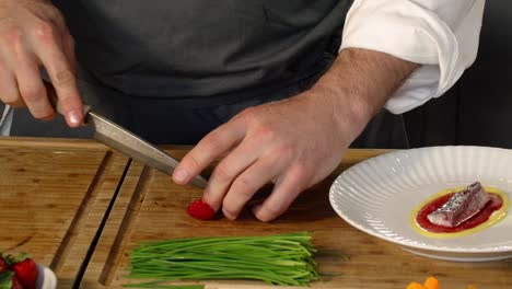 chefs preparing food in kitchen