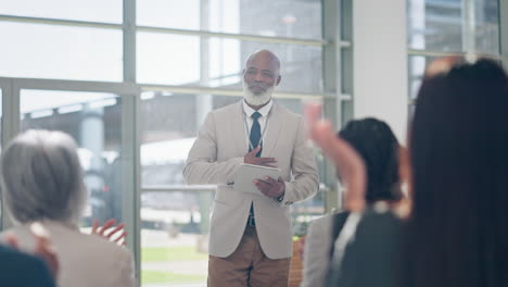 Presentation,-tradeshow-and-black-man-on-tablet