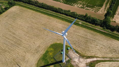 ariel view of wind turbine in english countryside