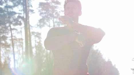 Young-man-warming-up-before-running