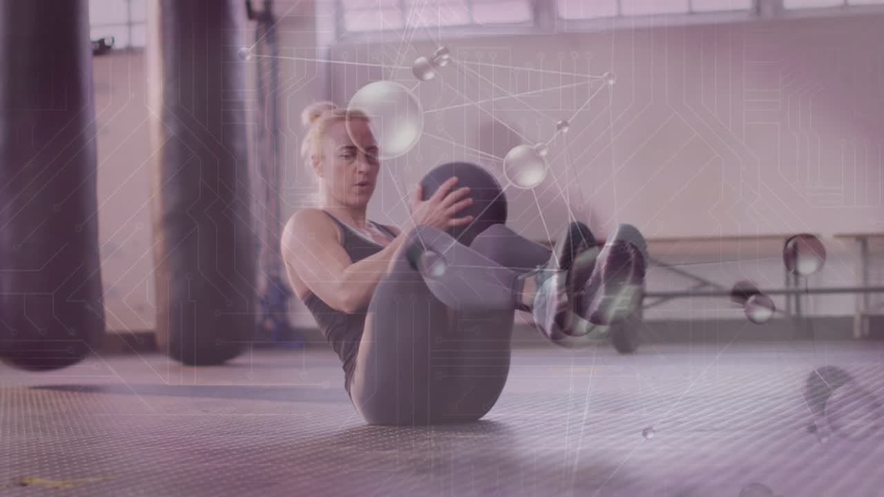 Woman starting hollow-hold rotating med ball across core for fitness as tech overlay tracing twists