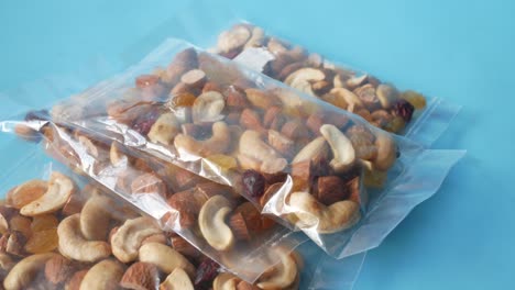 mixed nuts and dried fruit in transparent bags