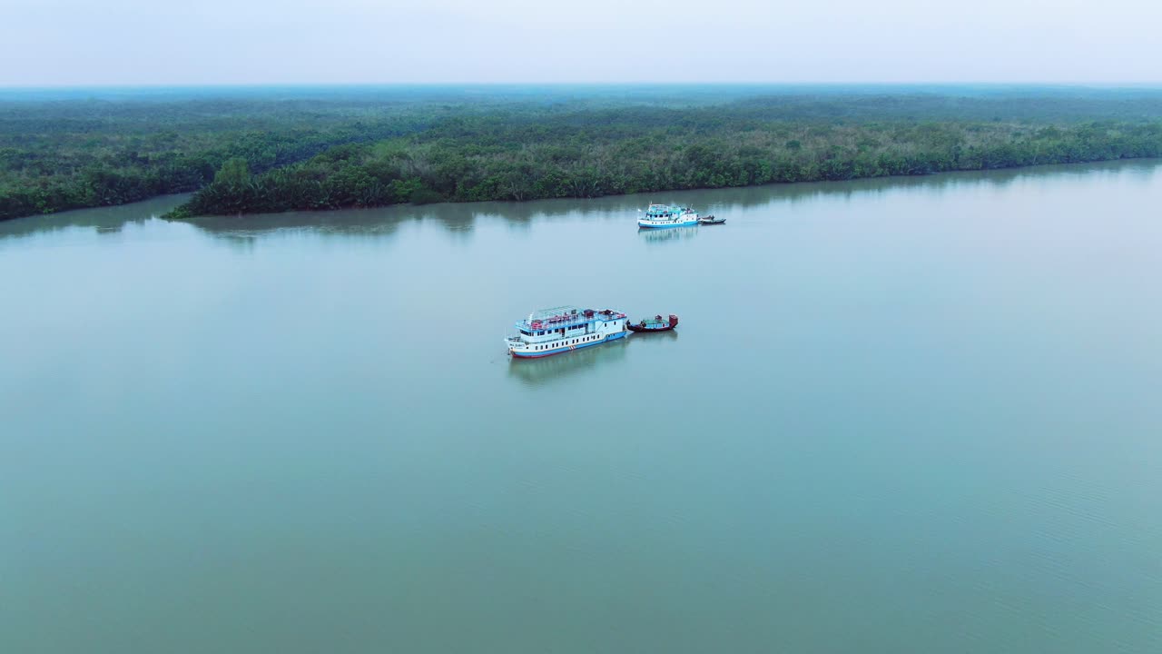4K Drone footage. Drone view of tourist boat from downwards in sundarbans. Sundarbans in Bangladesh with scenic beauty. scenic beautiful natural atmosphere