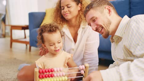 family playing with abacus