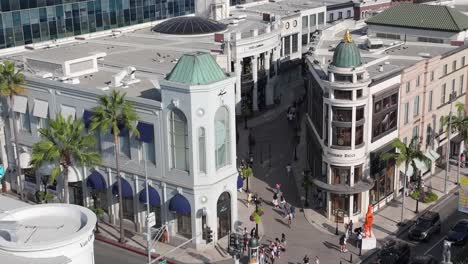 two rodeo, luxury shopping destination at intersection of rodeo drive and wilshire in beverly hills, aerial rising view