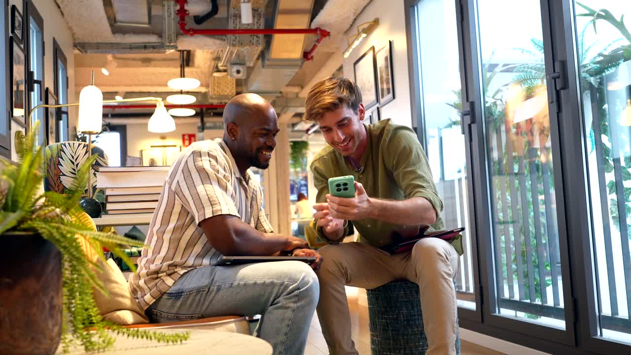 Happy Diverse Men Taking a Selfie Together in a Modern Office