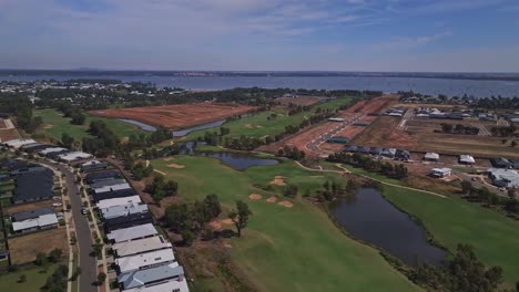 overhead new houses and the black bull golf course with the new building stage and lake mulwala beyond