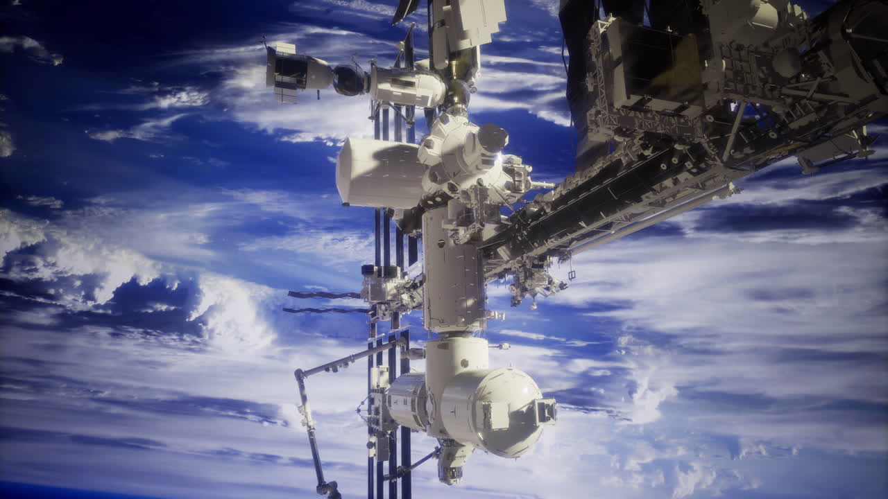 estación espacial en órbita alrededor de la tierra con impresionantes formaciones de nubes debajo