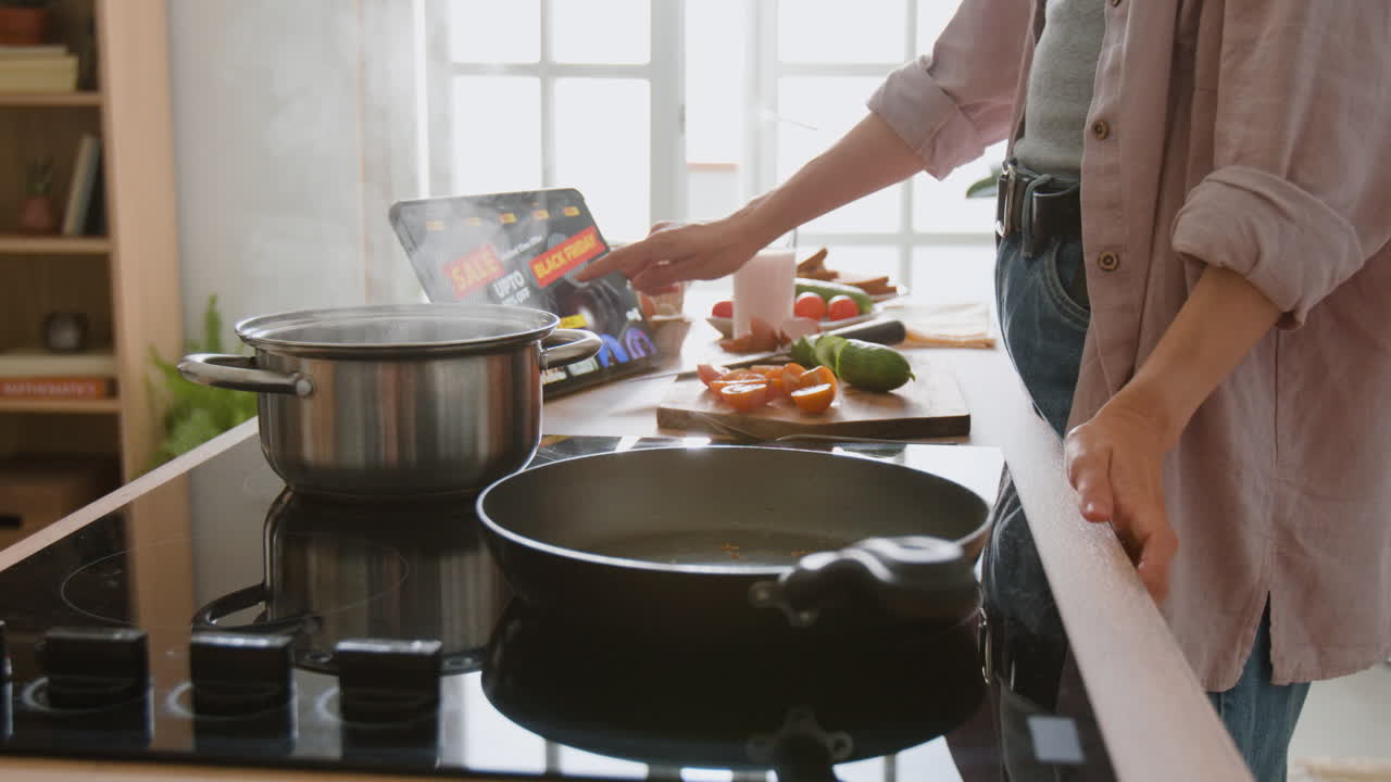 Person cooking healthy meal in kitchen