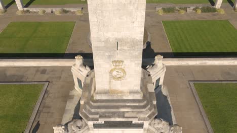 rising drone footage of navy war memorial southsea with southsea common behind on bright sunny day