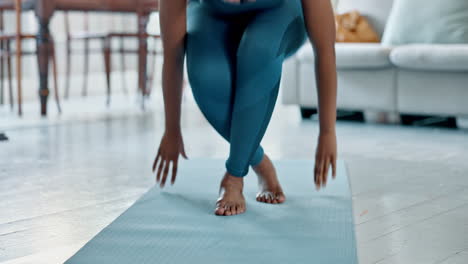 woman practicing yoga at home