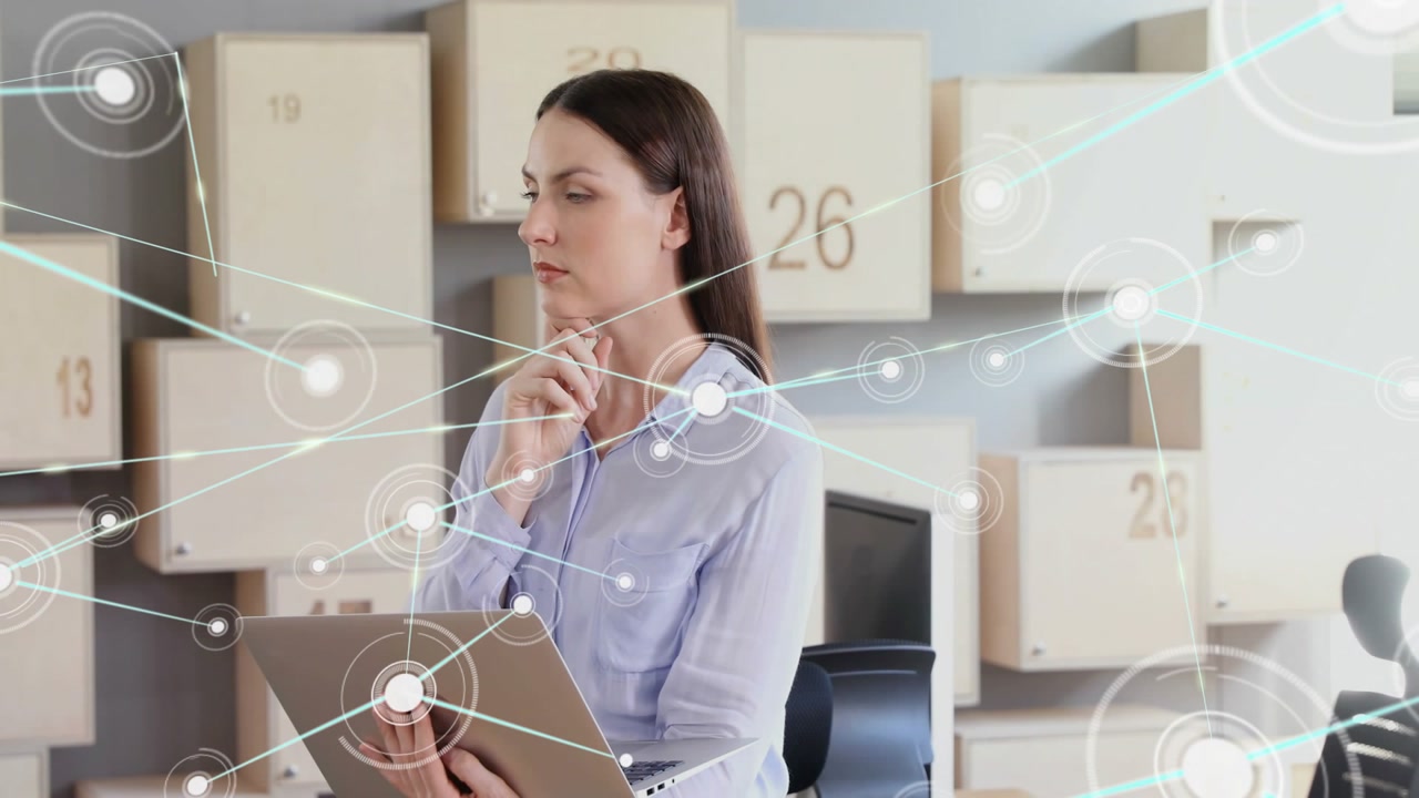 Office woman holding slim laptop tapping screen, initiating network overlay and analyzing data