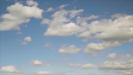 time lapse of beautiful dramatic puffy clouds against blue skies