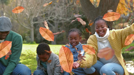 Animación-De-Hojas-De-Otoño-Cayendo-Sobre-Una-Feliz-Familia-Afroamericana-En-El-Parque