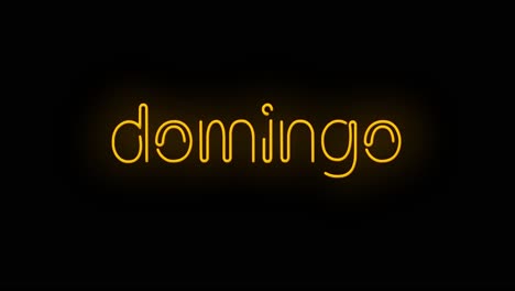 flashing orange yellow domingo sign on black background on and off with flicker