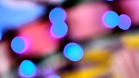 luces de colores borrosos. rojo, verde, amarillo, naranja, azul desenfocado bokeh brillante fondo festivo.