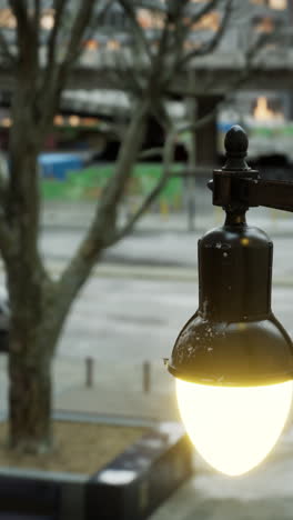 street lamp illuminating a city street at night