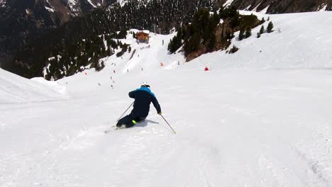 skiing short turns on a black ski slope in ischgl