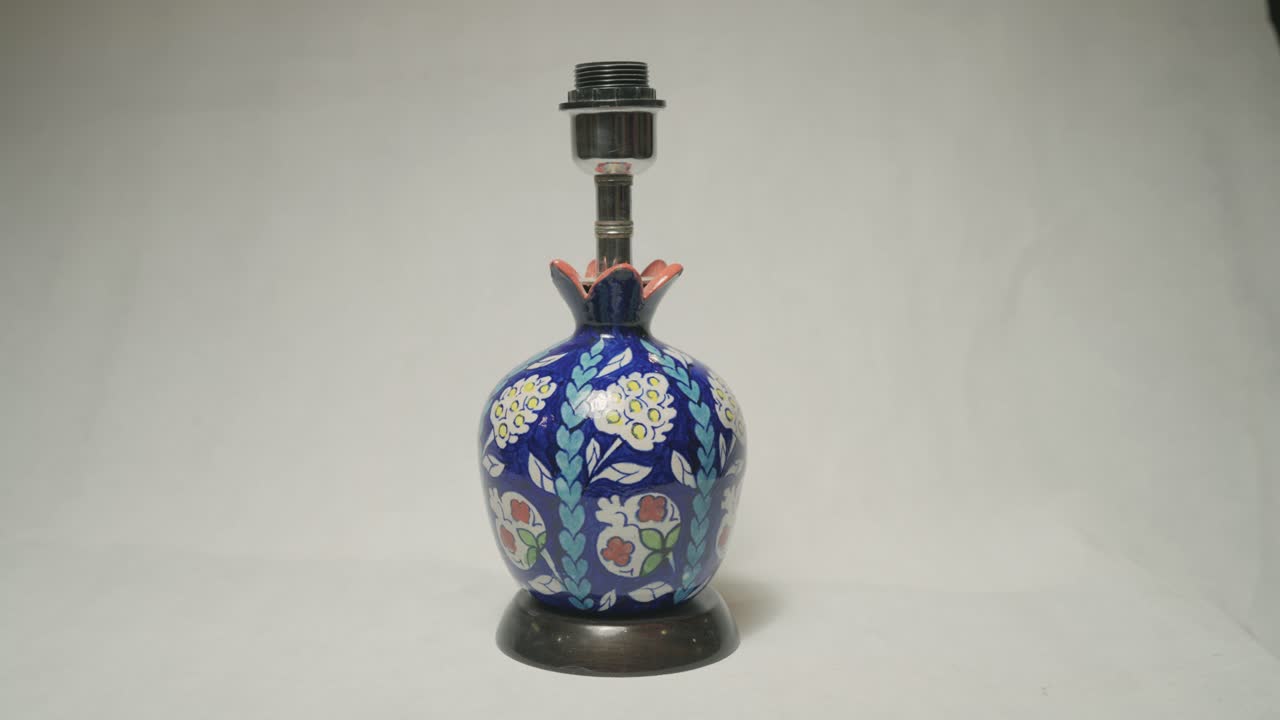 Profile view of an antique artifacts against a white background.