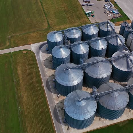 huge tanks for processing and storage of wheat grain. harvesting, processing and storage elevator for the crops. aerial view