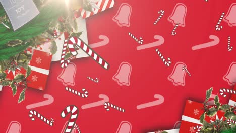 Animation-of-candy-canes-falling-at-christmas-over-presents