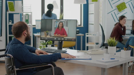 invalid manager talking with coworker during video conference