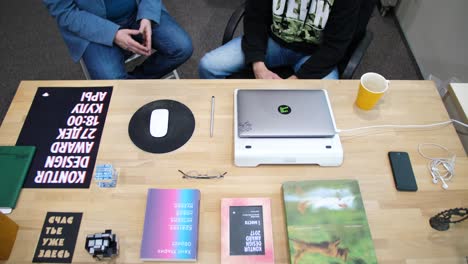 two people working at a desk