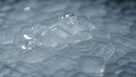 a close-up exploration of intricate ice crystal formations, capturing the beautiful patterns and textures of nature's frozen artistry under vibrant light