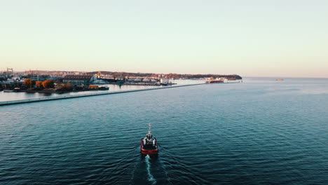 drone flying over the fishing boat sailing on the sea at the sunset-2