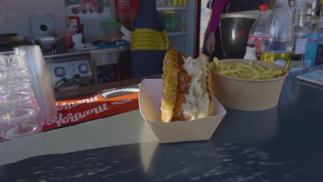 food preparation in a restaurant. sandwich and fries