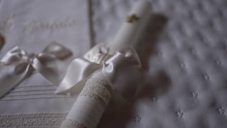 elegant baptism set with personalized towel, seashell, candle, and delicate ribbons