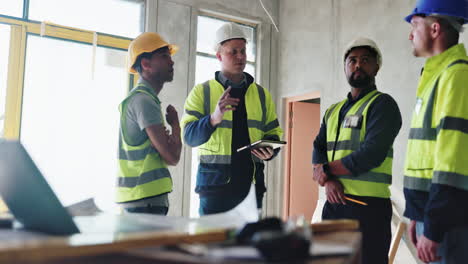 construction workers meeting at a job site