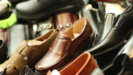 leather shoes piled up